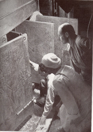 Howard Carter opening Tut’s tomb for the first time in centuries.